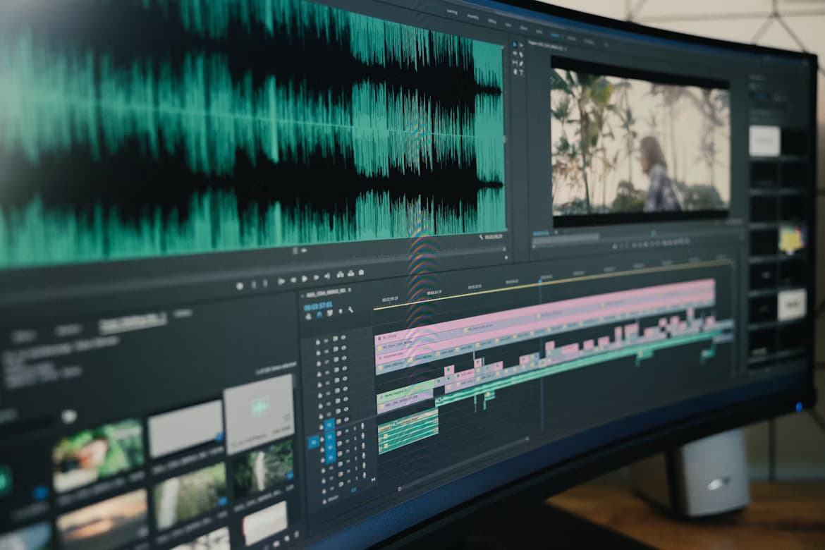 Editor reviewing audio waveforms and footage during post-production