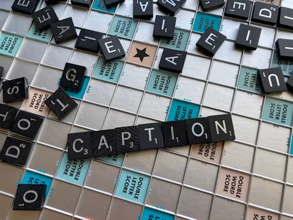 Wooden letter tiles spelling caption