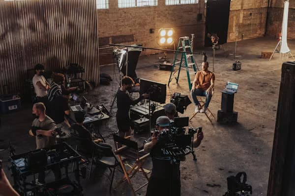 Film crew setting up a video production set