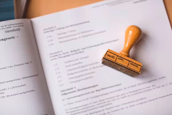 Compliance stamp being applied to an audited document